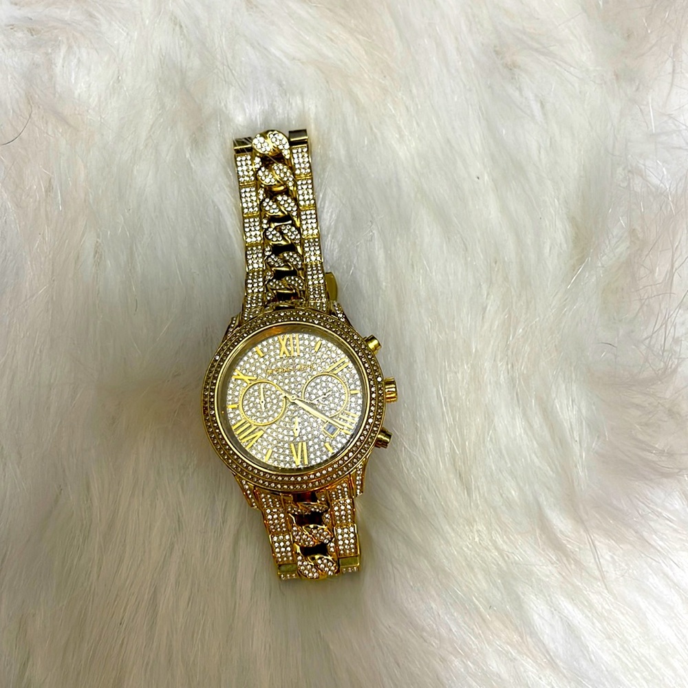 Michael kors gold watch with twisted diamond band